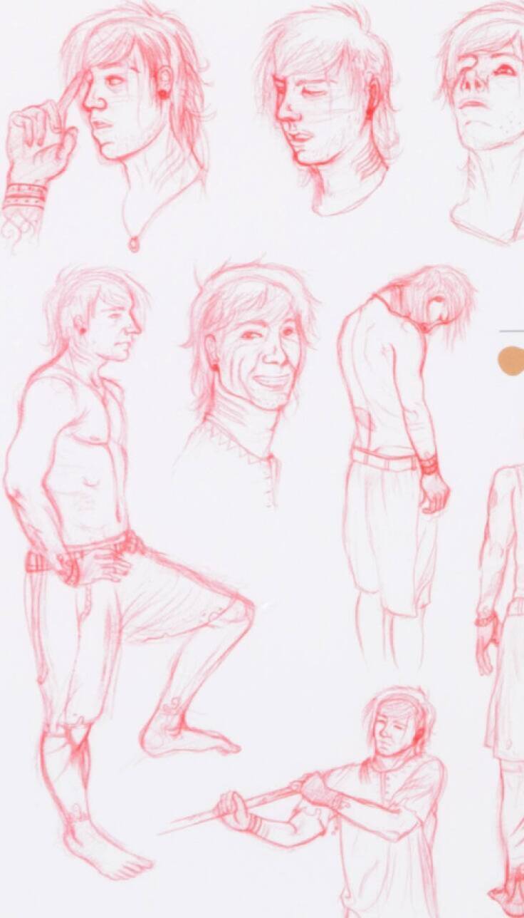 Left side of image has sketches of a fully realized character on the right. Character is shirtless wtih green shorts, red shoes and silver hair.